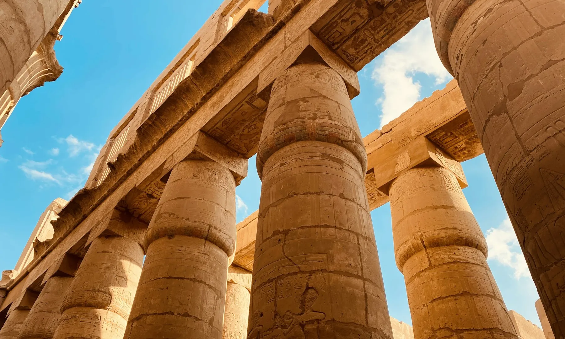 Columns of Karnak Temple against a blue sky